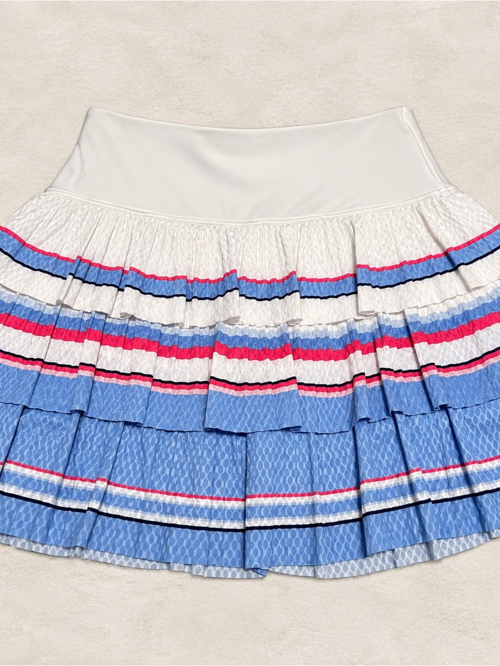 Lucky in Love Womenโs Tiered Pleated Skirt in White, Blue & Pink